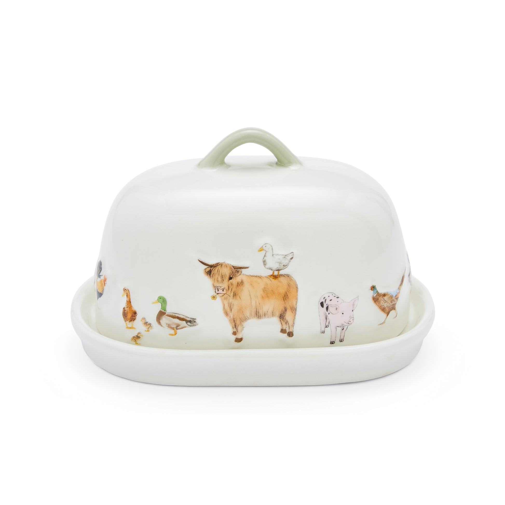 A white ceramic butter dish with a matching lid, decorated with a whimsical illustration of farm animals including a Highland cow, duck, goose, chicken, and pig. The lid features a light sage green handle.