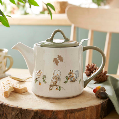 Cartco Cooksmart Forest Fable ceramic teapot featuring a woodland owl, squirrel, and bird design with a sage green lid.
