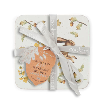 Cartco Cooksmart Forest Fable square coasters featuring a hare illustration with oak leaves and acorns tied with ribbon