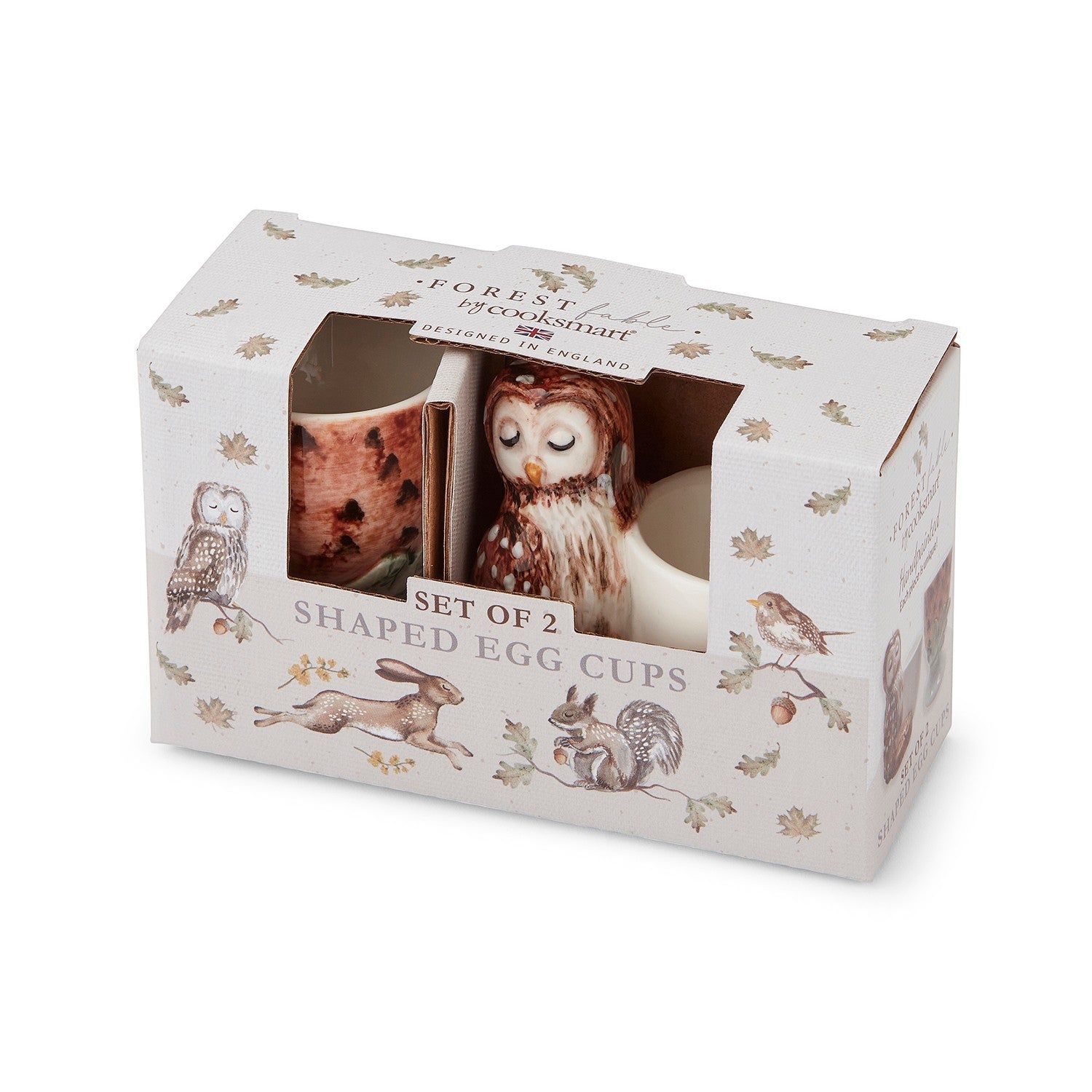 Cartco Cooksmart Forest Fable set of two ceramic egg cups featuring owl and acorn designs in decorative packaging.
