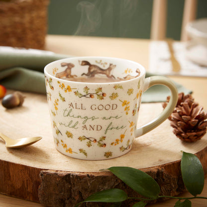 Cartco Cooksmart Forest Fable ceramic conical mug with botanical leaf, acorn, and animal print in sage green