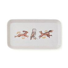 Cartco Cooksmart Forest Fable rectangular tray with hare, owl, and fox illustrations on a speckled cream background.