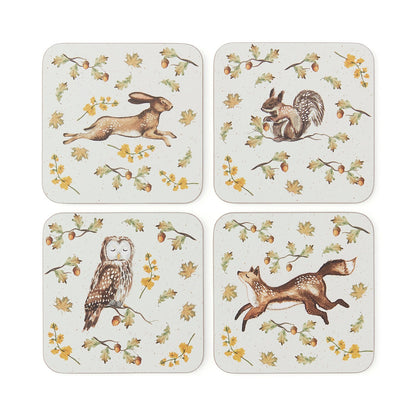 Cartco set of 4 square coasters featuring watercolor illustrations of a hare, squirrel, owl, and fox with oak leaves.