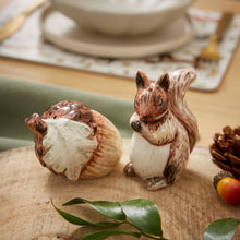 Cartco Cooksmart Forest Fable ceramic salt and pepper shaker set featuring a sculpted squirrel and acorn design.