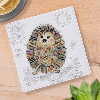 Cartco Bug Art Hattie Hedgehog ceramic coaster with a colourful floral illustration on a white square surface.