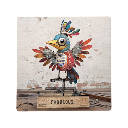 Cartco ceramic coaster featuring a colourful Bug Art Scrap Bird illustration with cork backing on a wooden table.